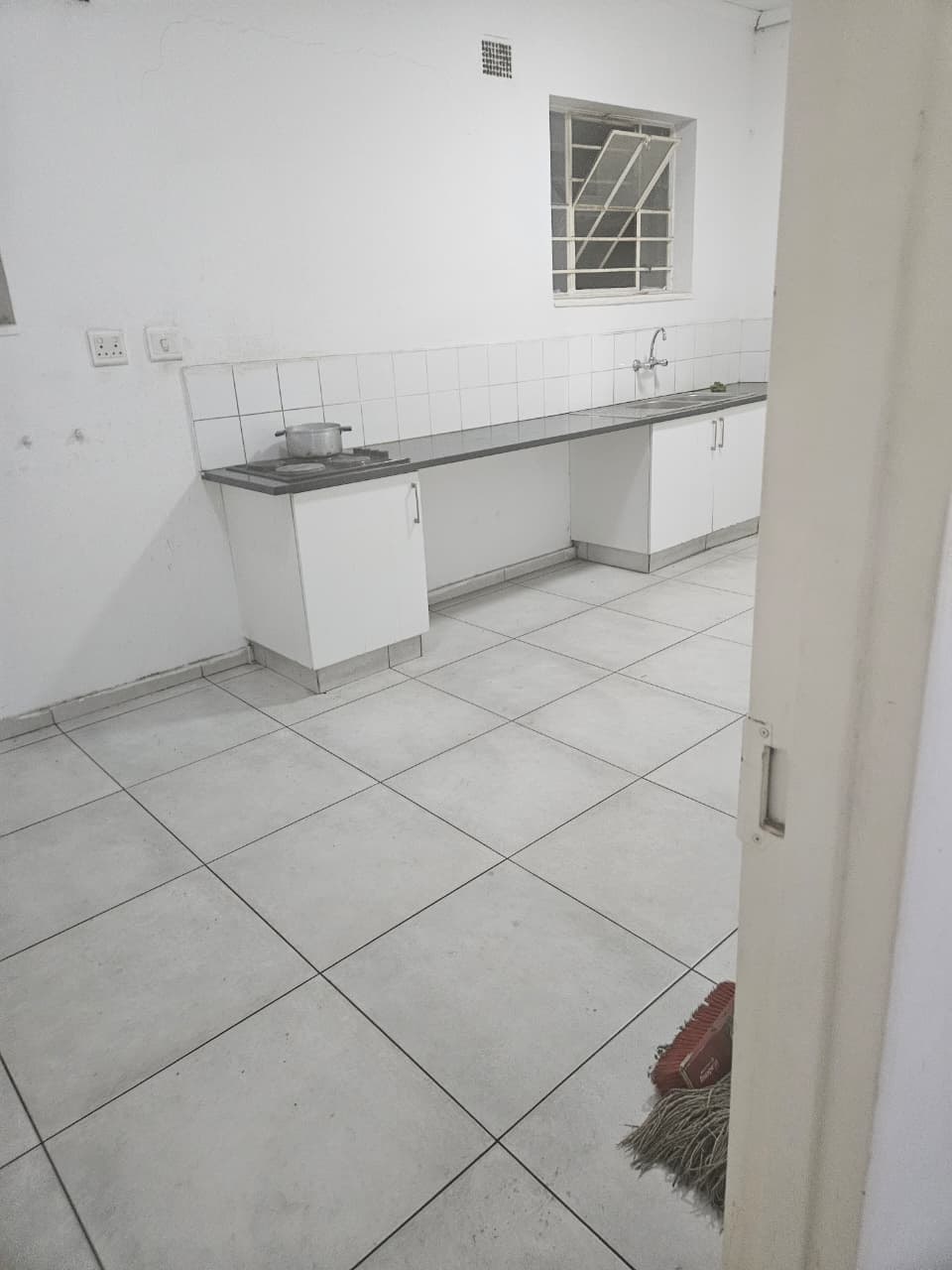 New floor and wall tiling in a kitchen